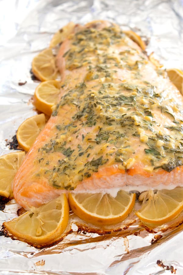 salmon with lemon border and herb topping