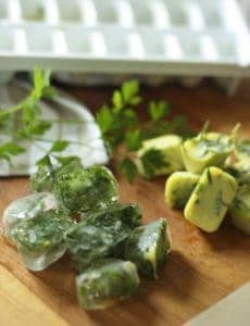 Frozen herbs in water and olive oil