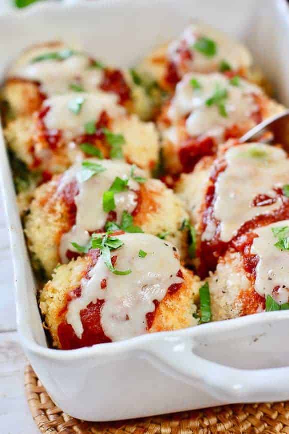 Chicken Rollatini in a white baking dish