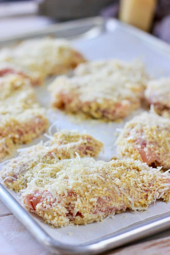 crispy coated chicken thighs on a sheet pan