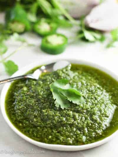 Chimichurri sauce in a white dish