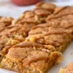 apple bars on a sheet of parchment paper