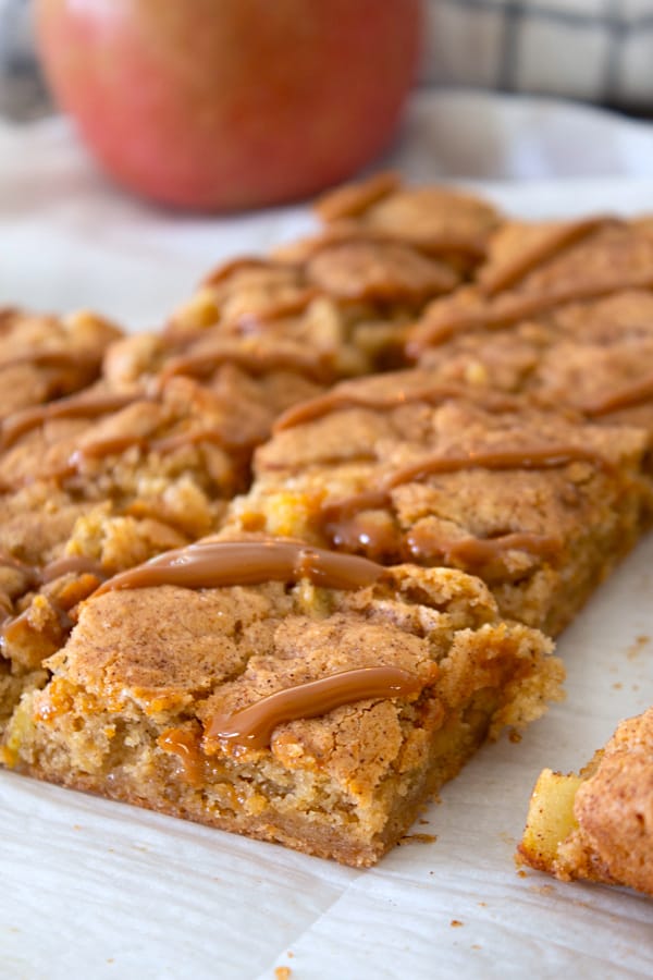 apple bars on a sheet of parchment paper