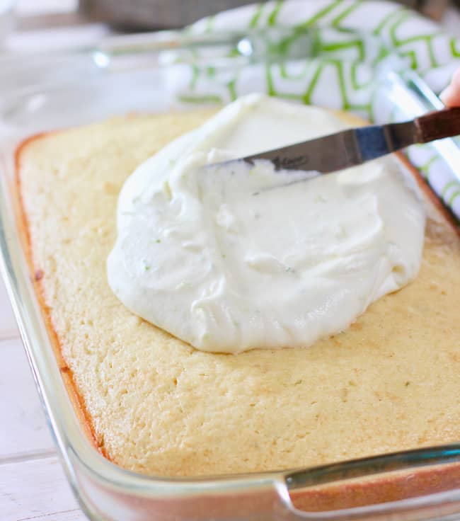Key Lime Cake being frosted