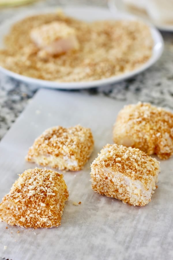 dredged oven baked fish and chips on parchment