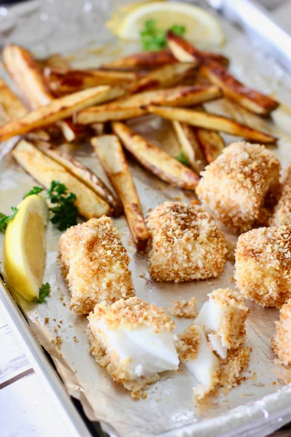 fish and chips on a baking sheet