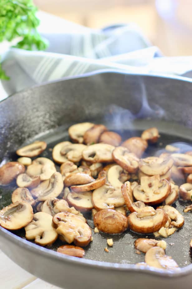 mushrooms browning in pan