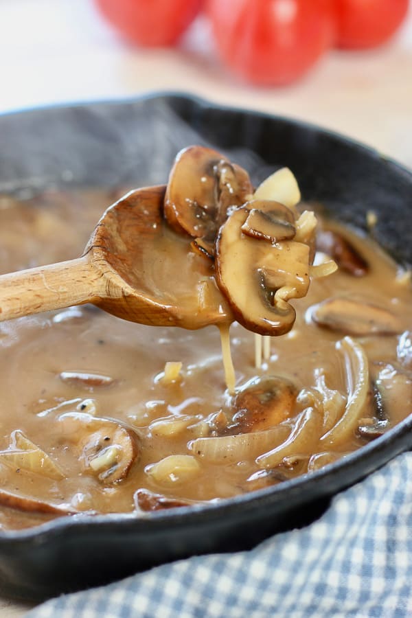 mushroom and onion gravy in cast iron skillet