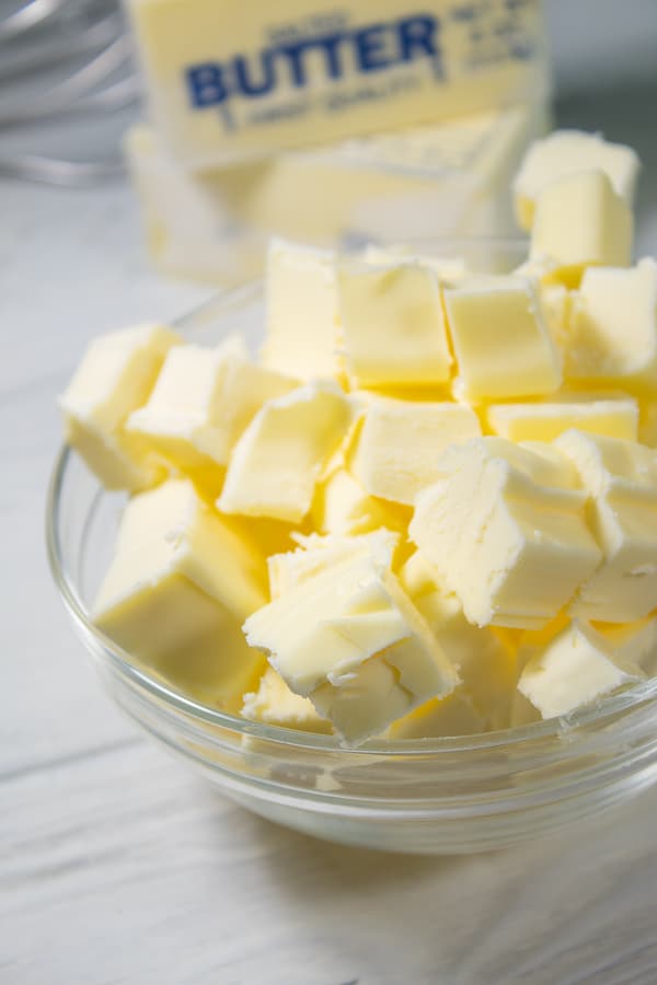 a clear bowl full of cold, cut cubed butter