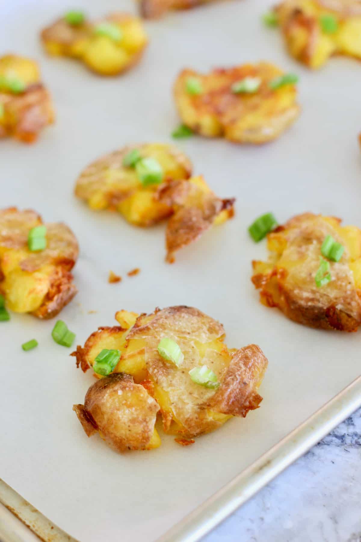 Bacon Fat Crispy Smashed Baby Potatoes - Simply Delicious