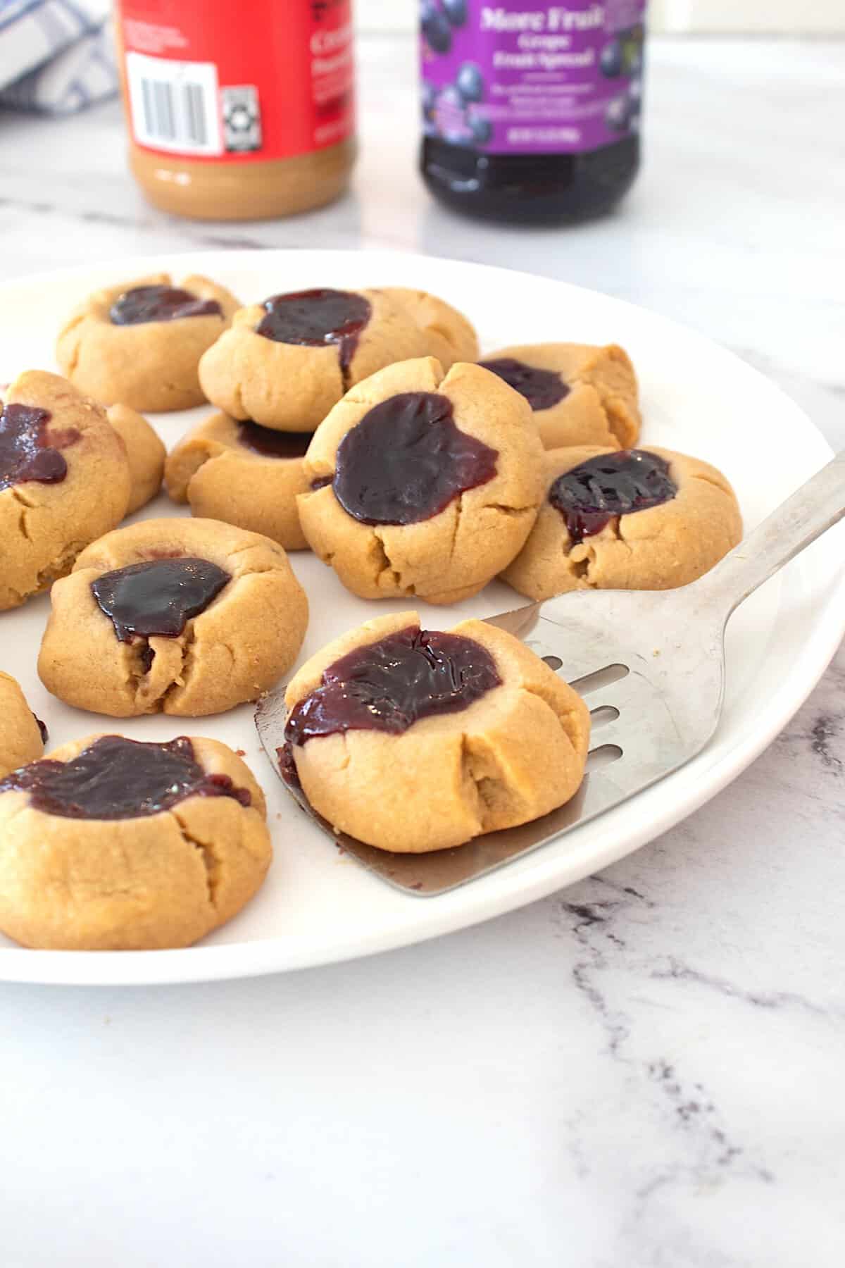 peanut butter and jelly cookies on a plate