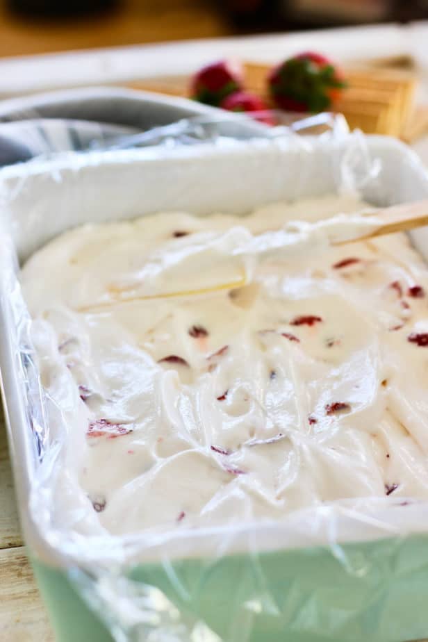 Pour yogurt mixture over the graham crackers