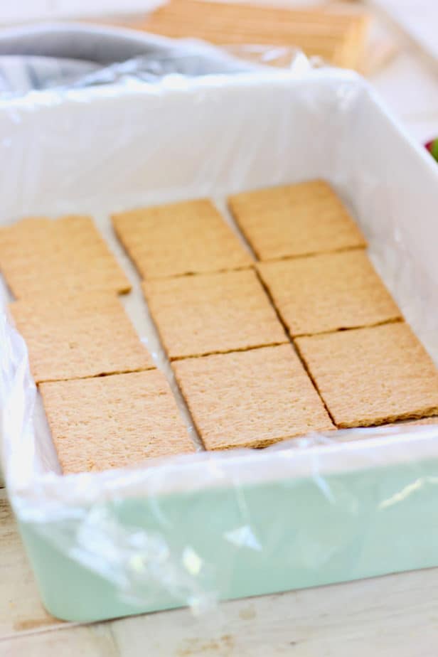 line 12 graham crackers on top of saran wrap