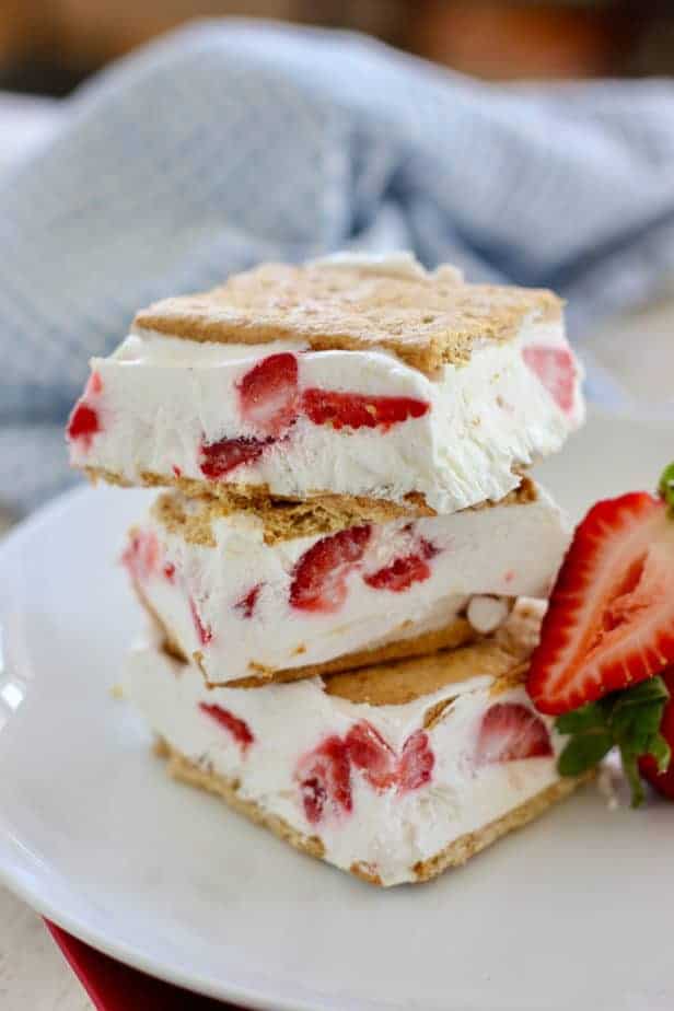 Skinny Strawberry Yogurt Bars stacked on a white plate