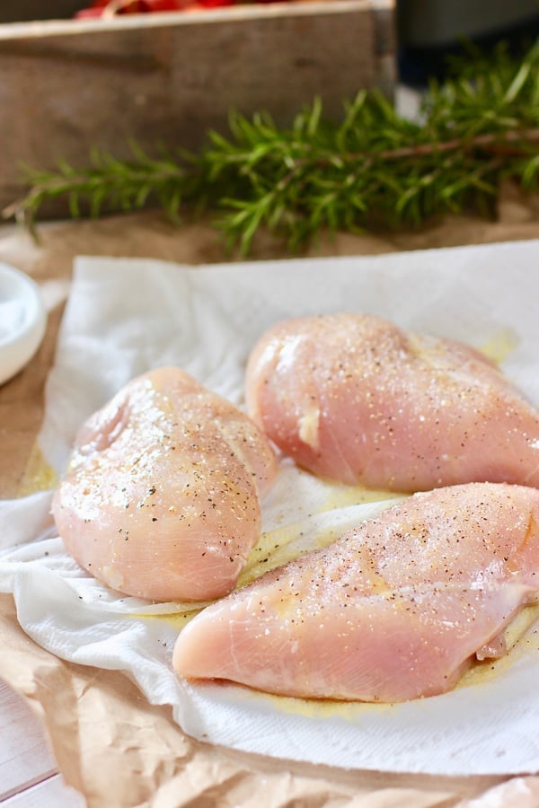 chicken with olive oil salt and pepper ready to sear