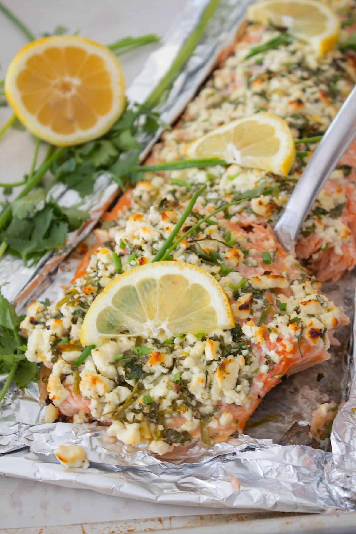 feta and herb crusted salmon on a sheet pan