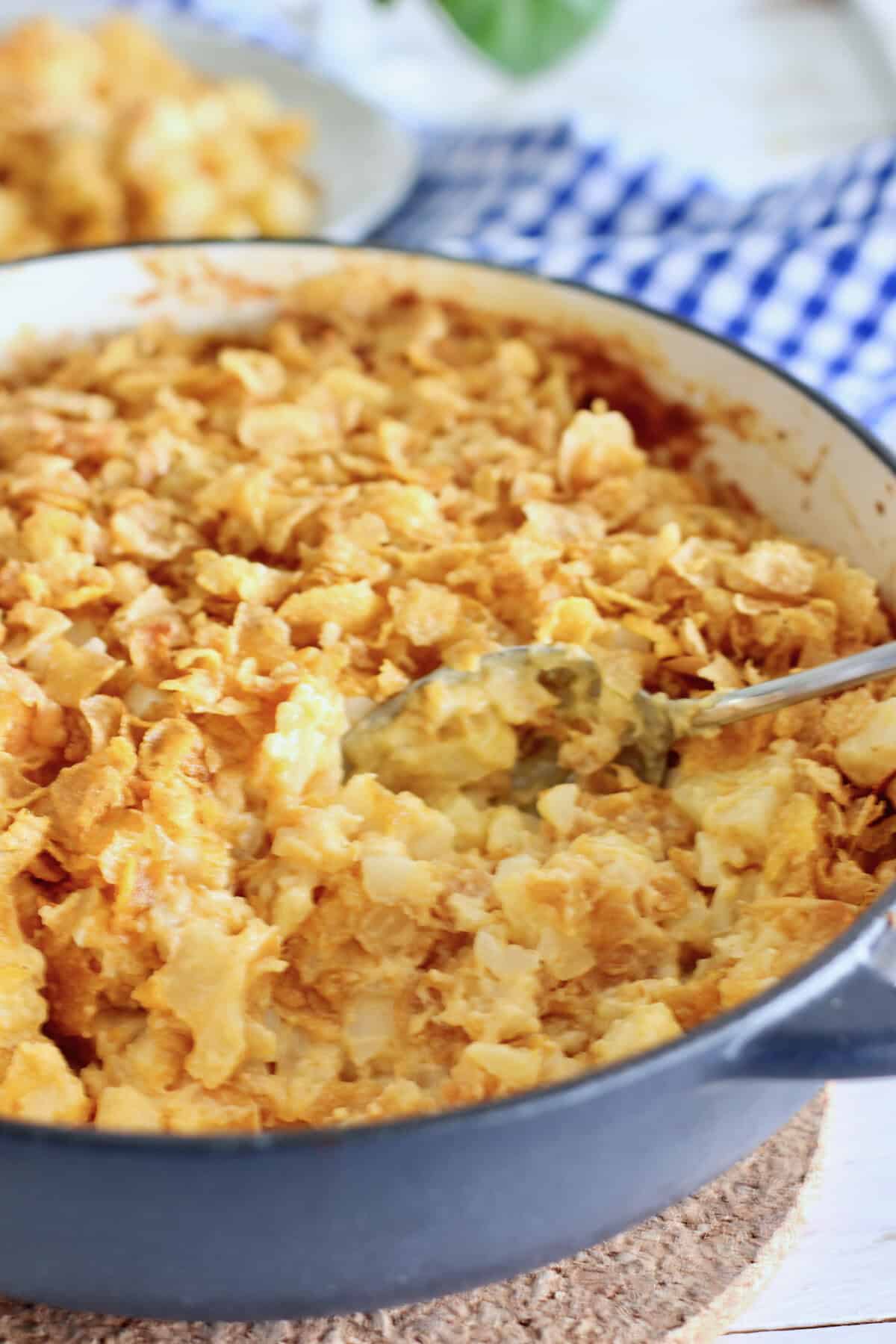 Cheesy potatoes with cornflake topping