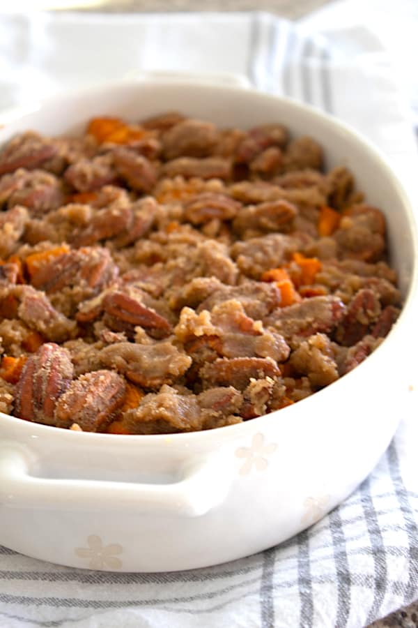 unbaked casserole in a white ceramic dish