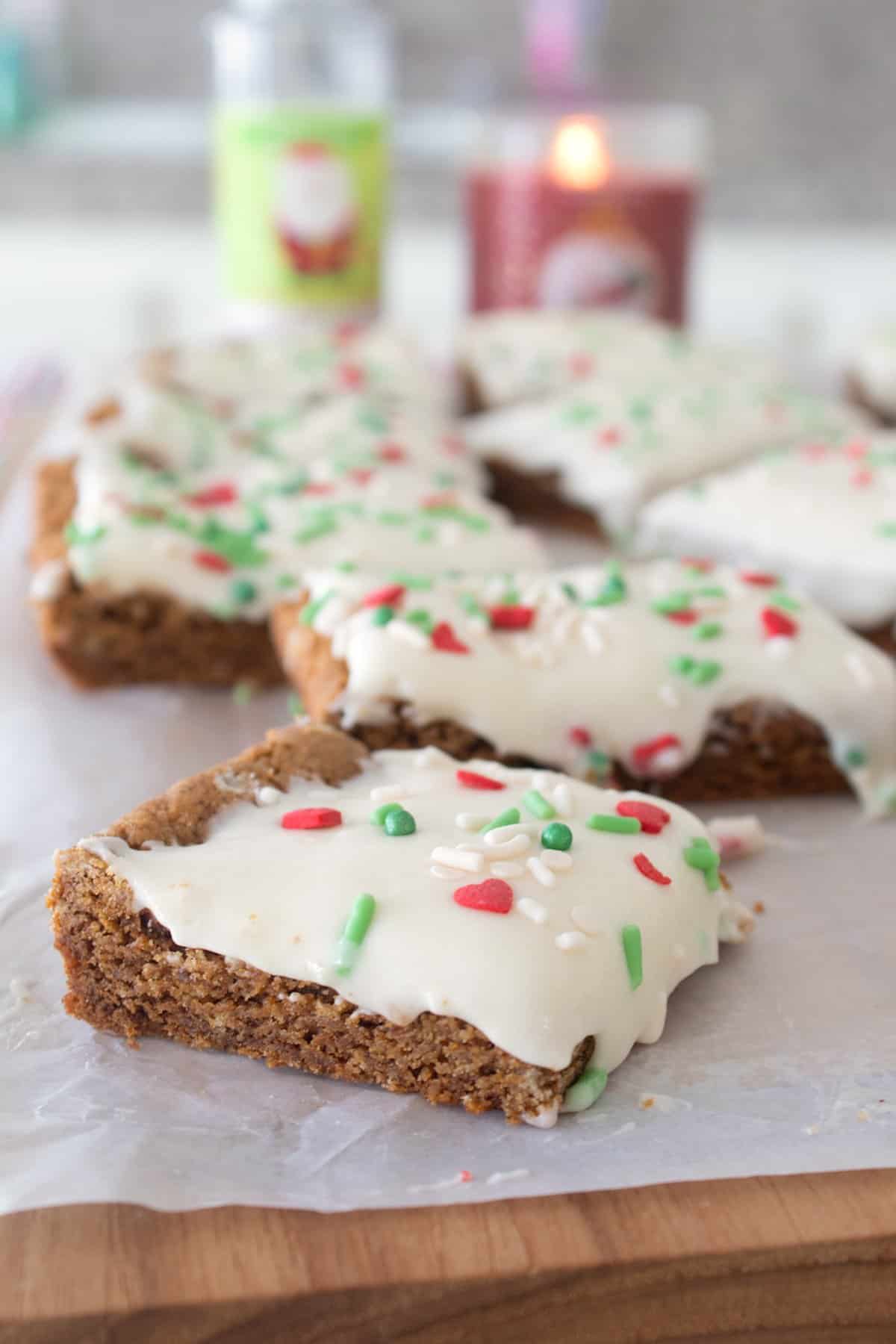 close up of gingerbread cookie bar on parchment paper 