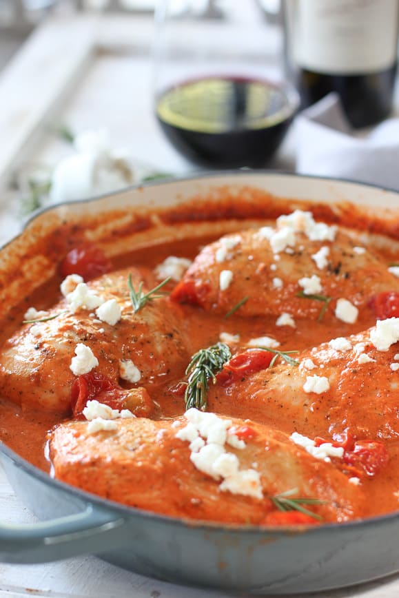 chicken in a pretty pan with red pepper sauce