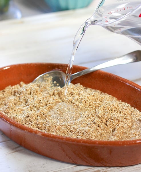 Add HOT water to rinsed quinoa