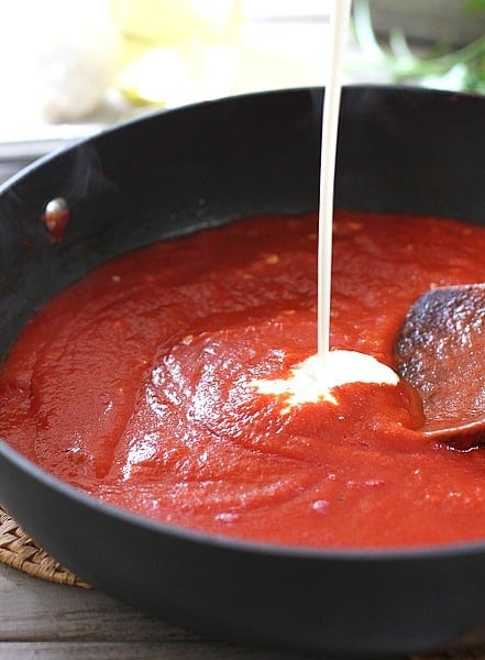 Adding cream to simple tomato sauce