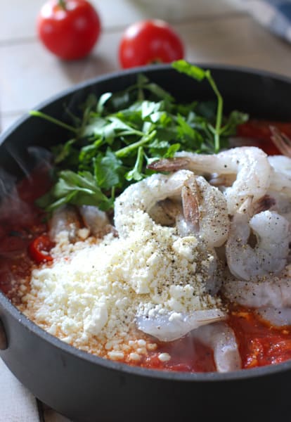 Shrimp, tomatoes and Feta in a skillet