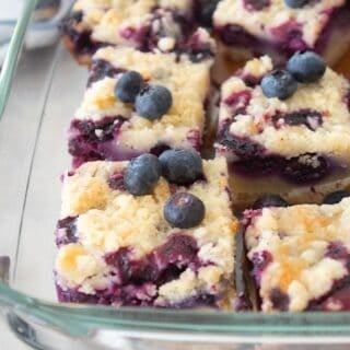 blueberry pie bars in a clear pyrex dish