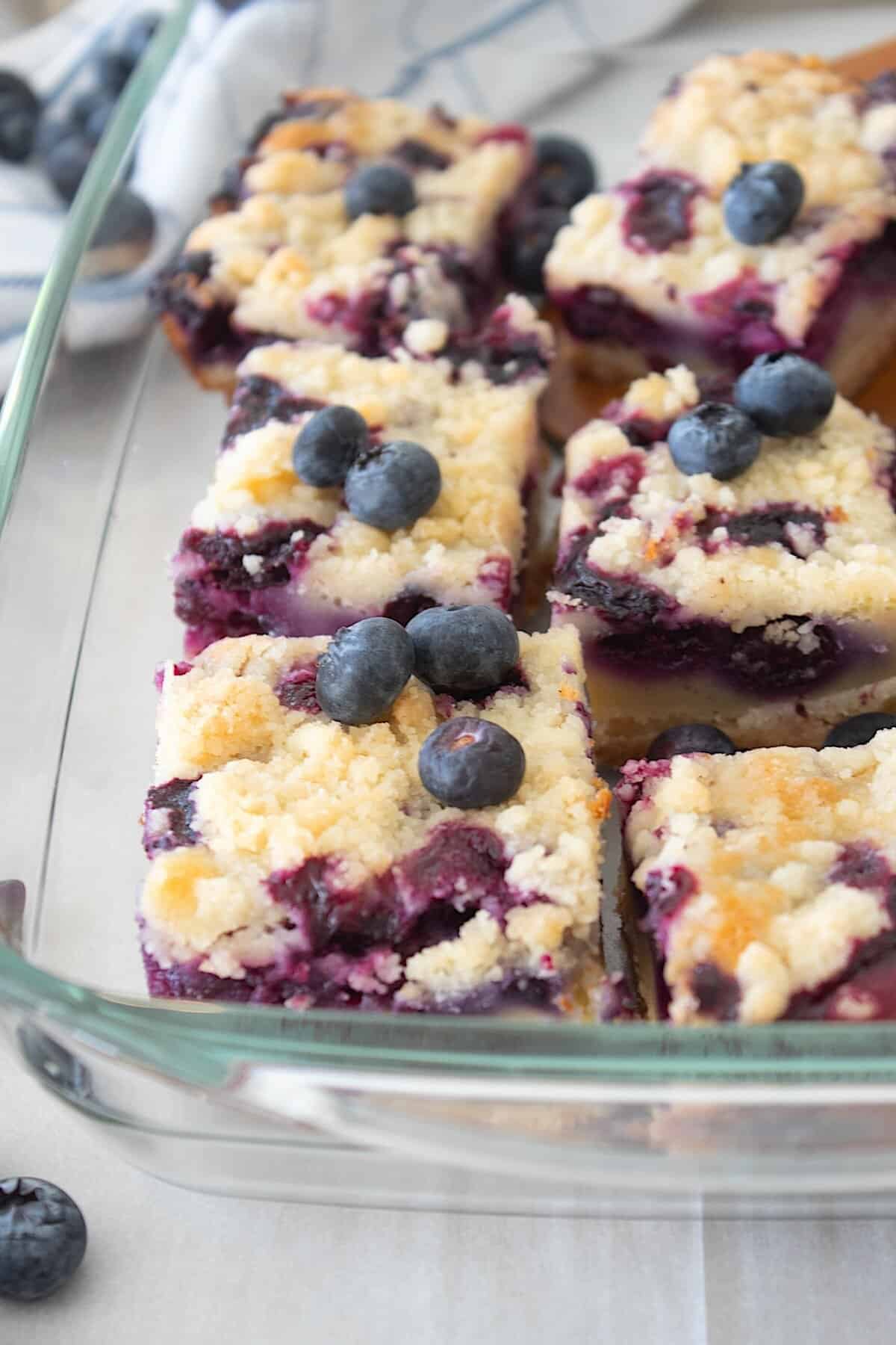 blueberry pie bars in a clear pyrex dish