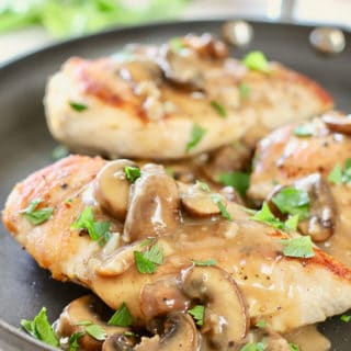 Seared Chicken with Mushroom Sauce on skillet
