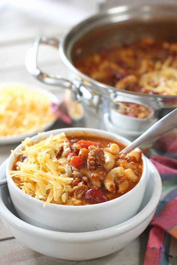 Chili Mac Soup in a bowl with a pot