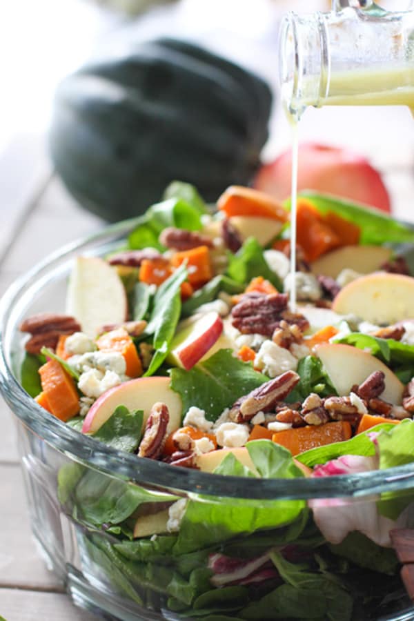 beautiful fall salad in clear bowl