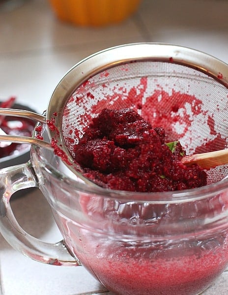 crushing cranberries