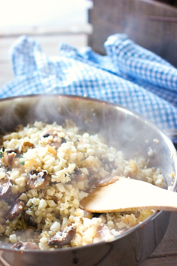 Cauliflower Rice cooking in skillet 