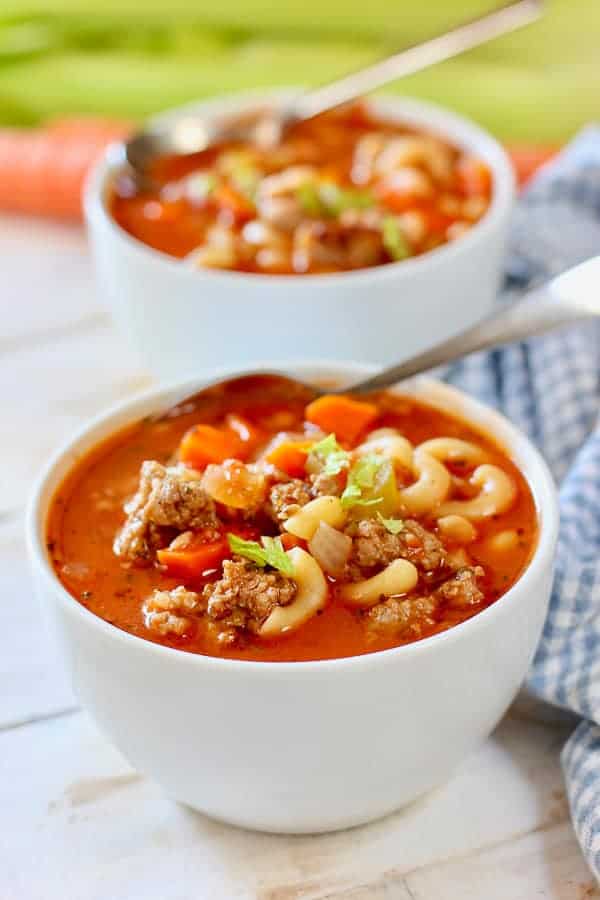 minestrone sauste soup in white bowls