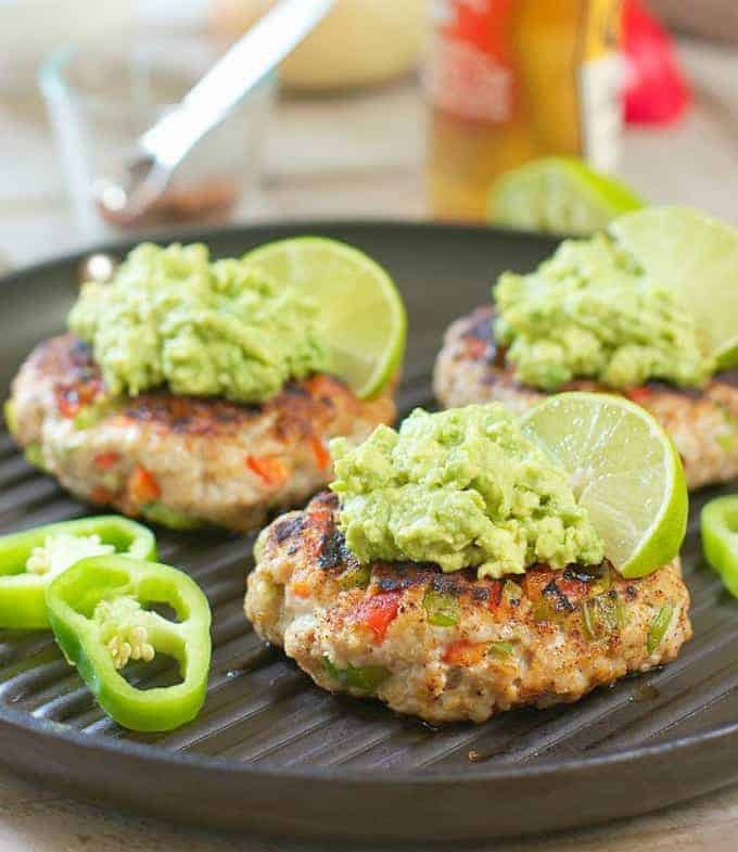 Chili Lime Burgers with Avocado Salsa on a grill pan