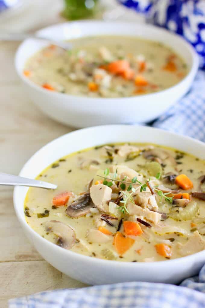 two bowls of chicken and wild rice soup