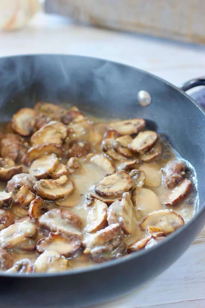 Saute mushrooms in a skillet