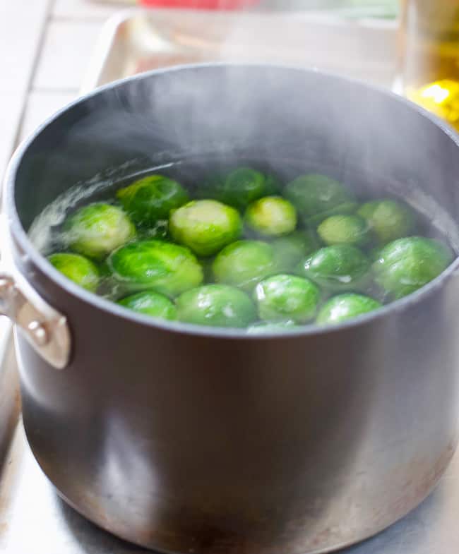 Boiling the brussels sprouts will remove the bitterness associated with this veggie