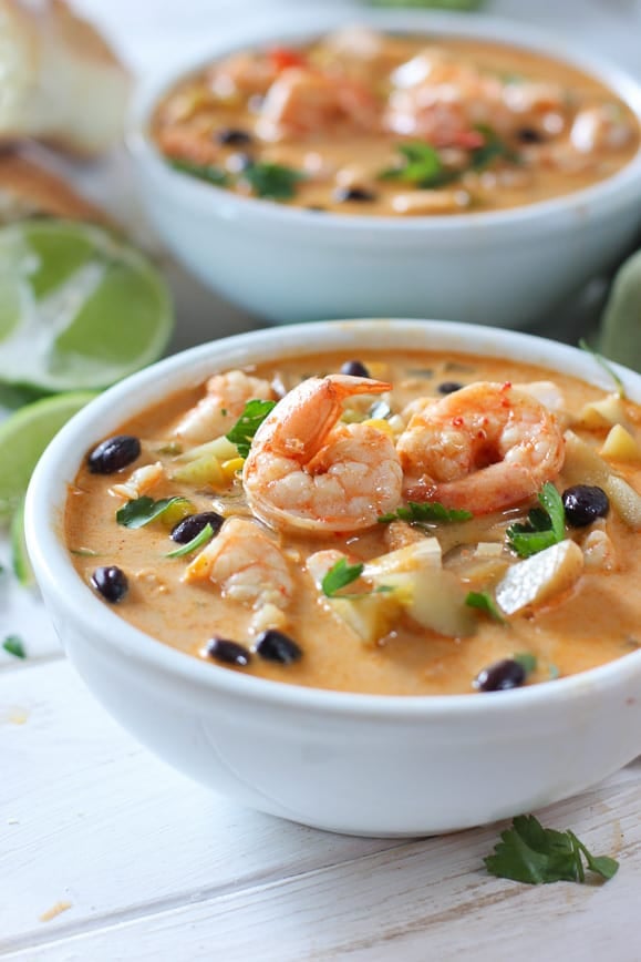 Shrimp and corn chowder in a white bowl ready to eat