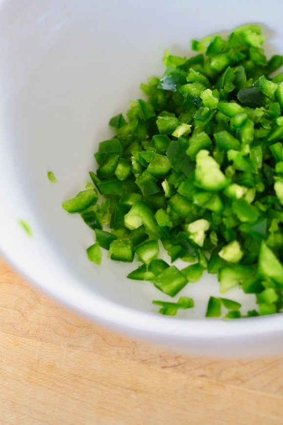  finely chopped jalapeño in a white bowl