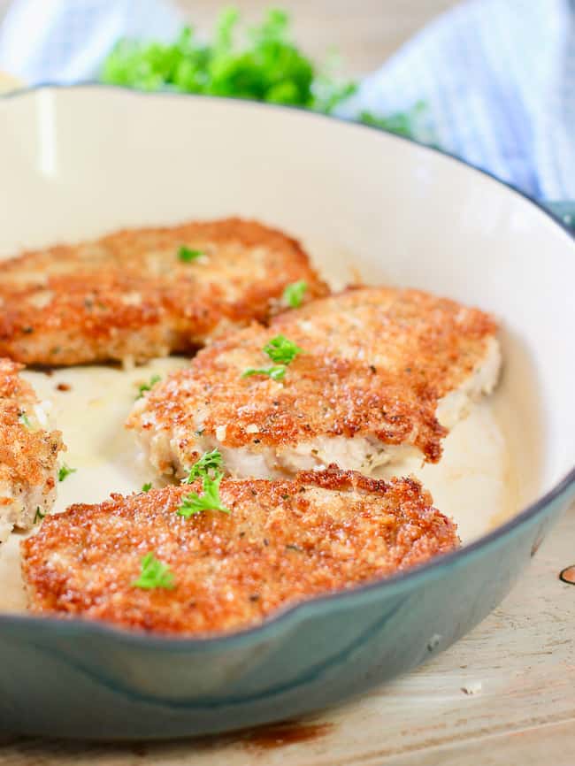 Crispy cutlets browned up in a blue skillet