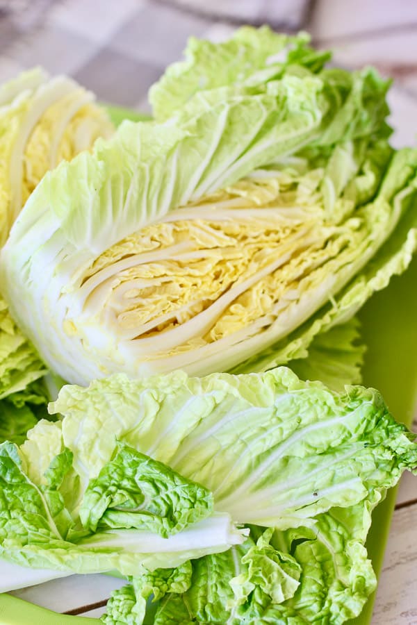 napa cabbage sliced on a cutting board