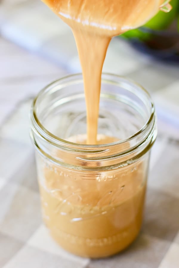 thai peanut salad dressing in a jar