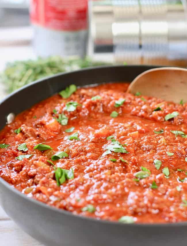 Classic Bolognese Sauce in a large black skillet