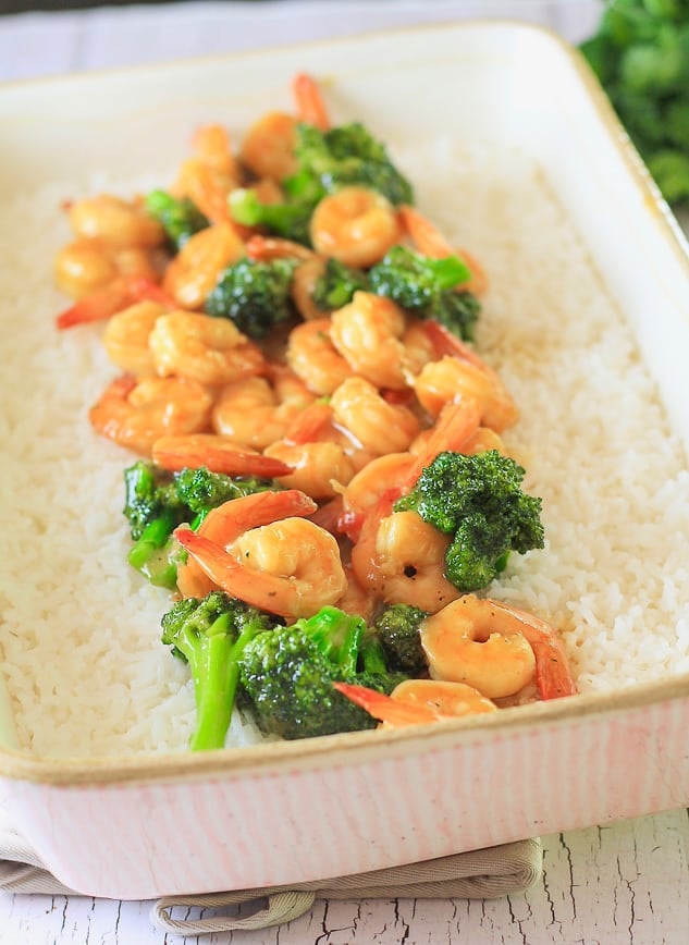 Shrimp and Broccoli Stir Fry served in a pink casserole dish 