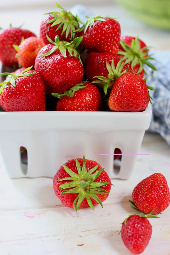 Fresh Strawberries in a white ceramic dish