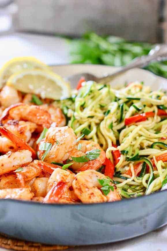 Shrimp and Zucchini noodles in a blue cast iron pan