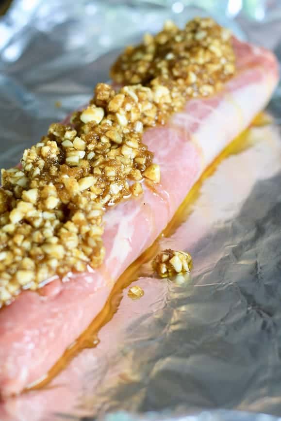 pork loin with brown sugar/garlic before going in oven on sheet pan with foil