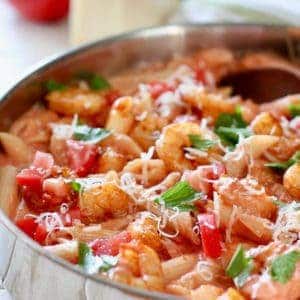 Creamy shrimp in tomato sauce in a large skillet